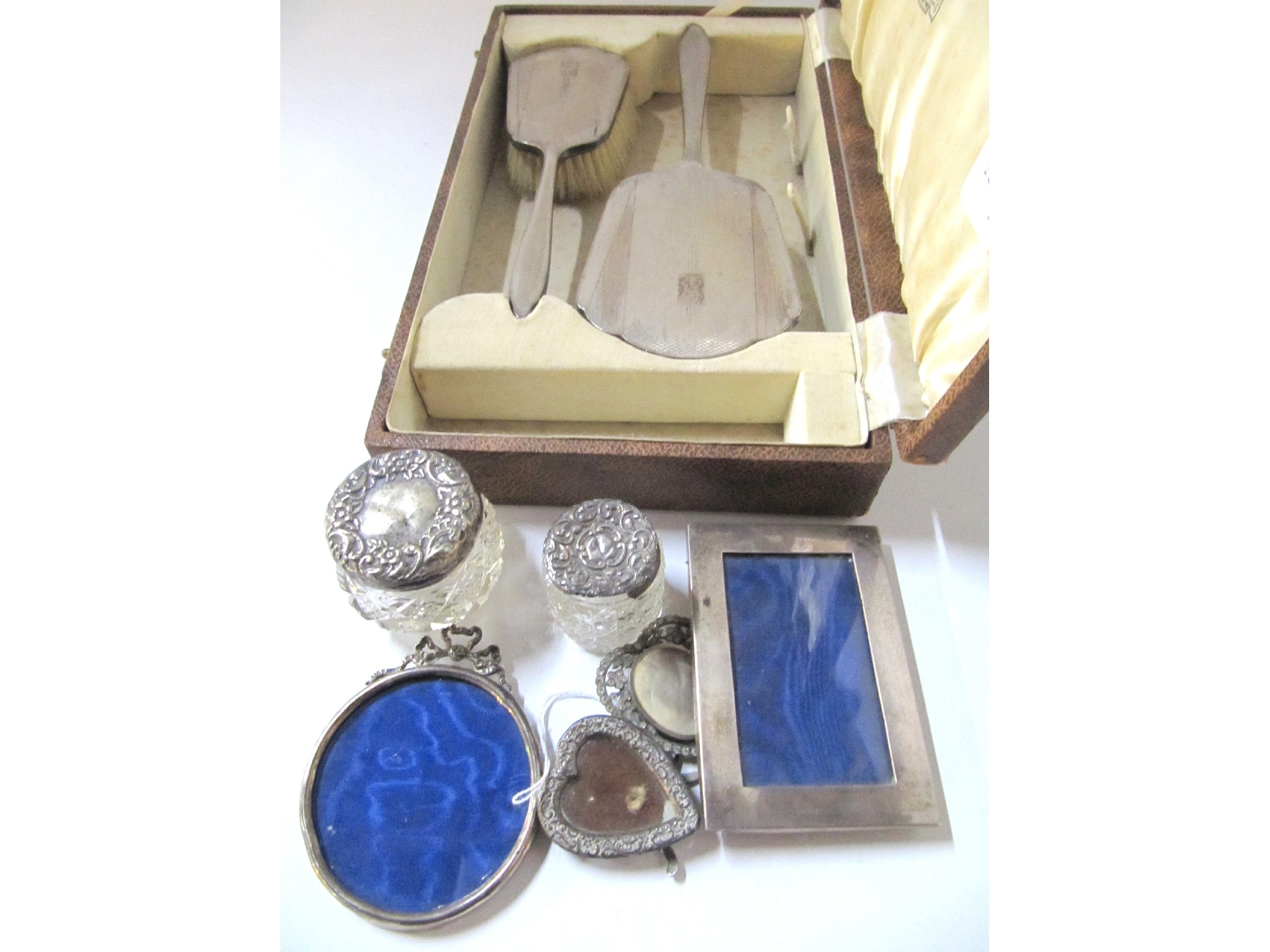 Appraisal: A lot comprising a cased silver dressing table set two