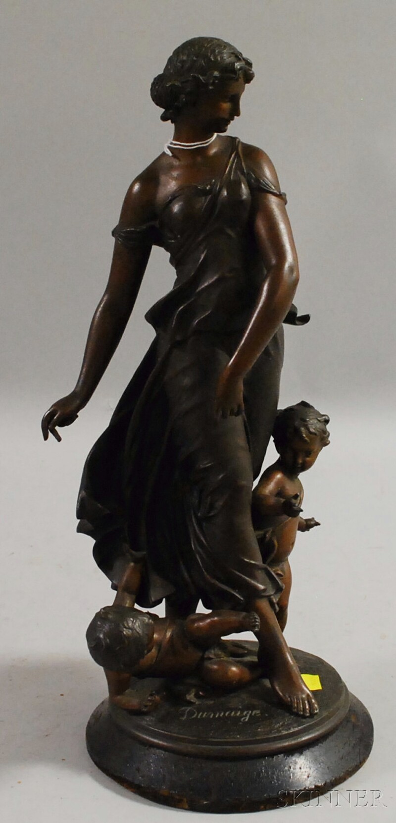 Appraisal: Patinated Cast Metal Figural Group Depicting a Maiden with Cherubs