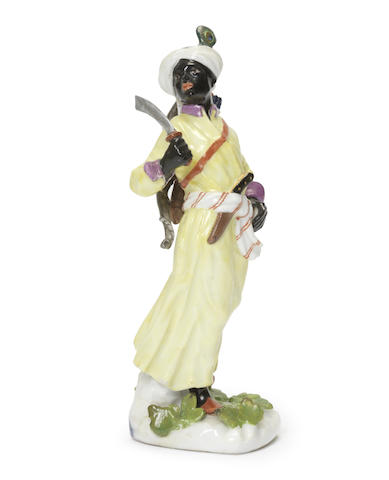 Appraisal: A Meissen figure of a blackamoor archer circa Wearing yellow