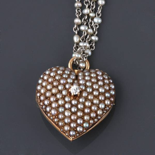 Appraisal: A seed pearl diamond and gold heart pendant-brooch with seed