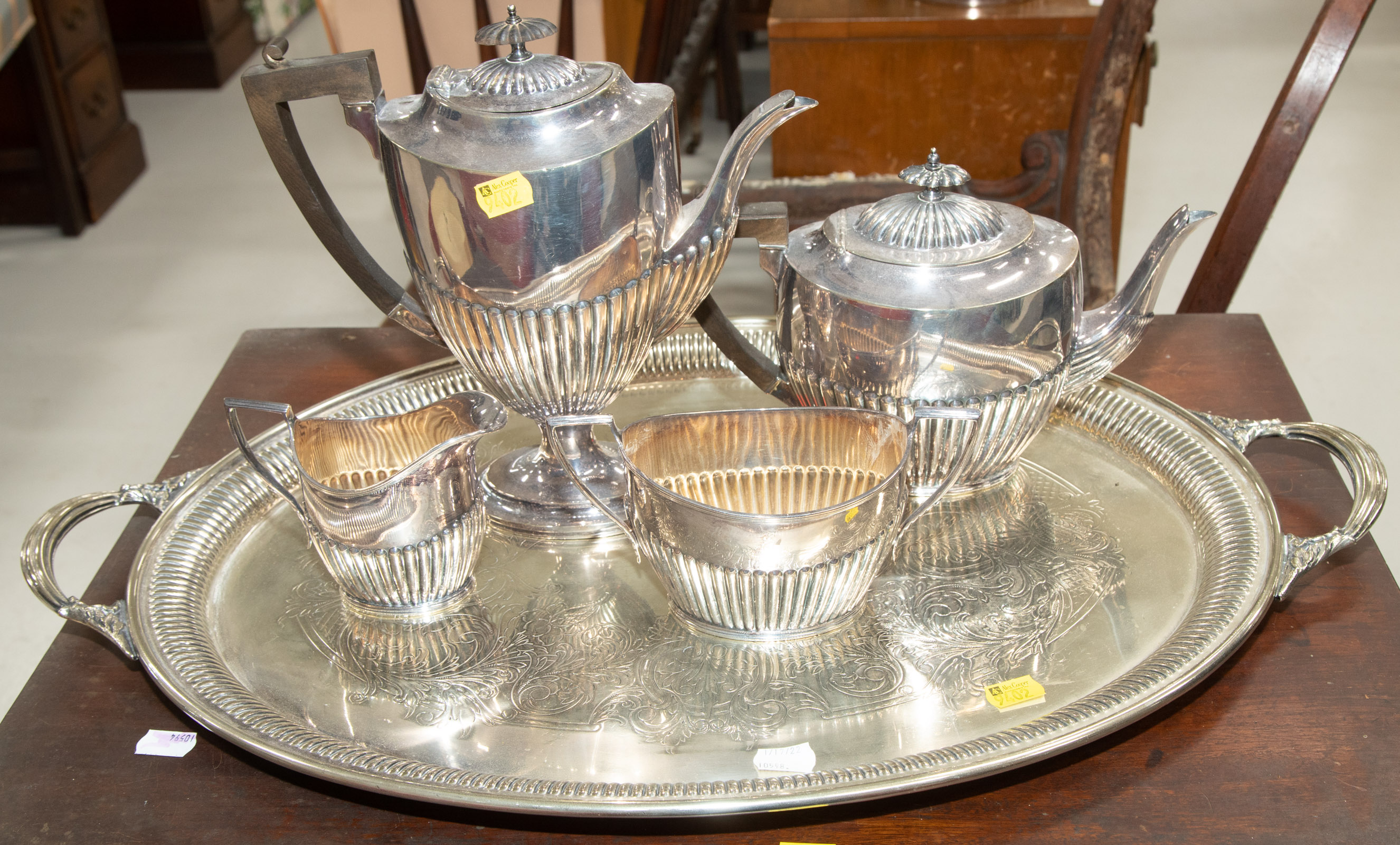 Appraisal: SILVER PLATED TEA SET Comprising five pieces Includes coffee pot