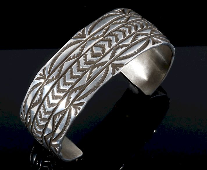 Appraisal: Signed Navajo Sterling Silver Carved Bracelet Featured in this lot