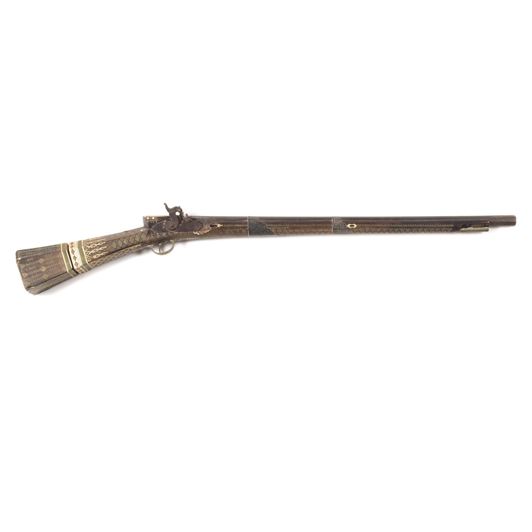 Appraisal: Middle Eastern style cap and ball musket ornately decorated with