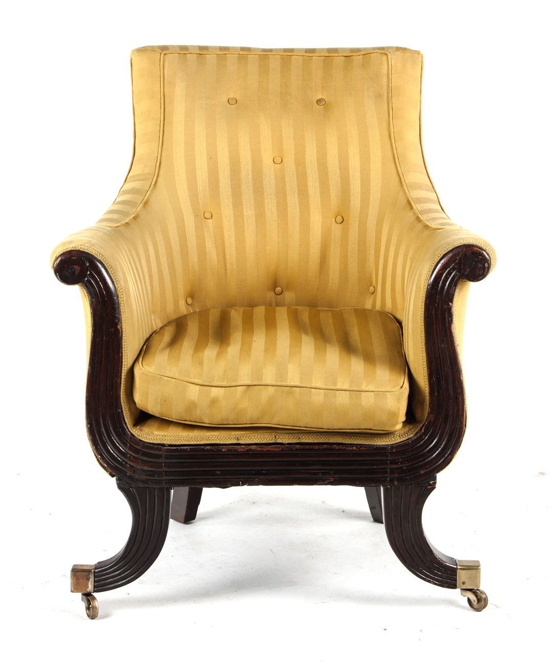 Appraisal: Regency mahogany upholstered armchair circa reeded arm curule-form legs yellow