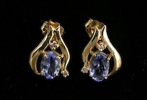 Appraisal: A Pair of Gold Tanzanite and Diamond Earrings A lovely