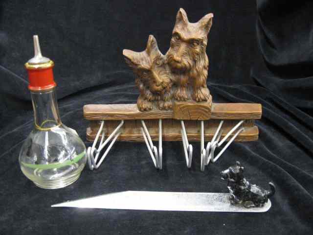 Appraisal: Scotty Dog Decorated Items sewing ruler hanger bitters bottle