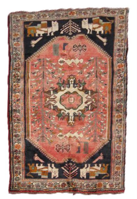 Appraisal: A late Qashgai carpet the double arched madder field with