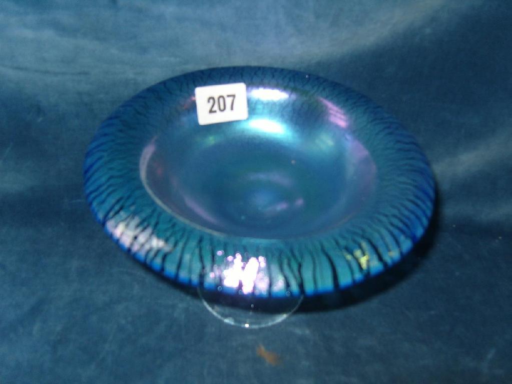 Appraisal: An Okra tazza with blue and green mottled finish and