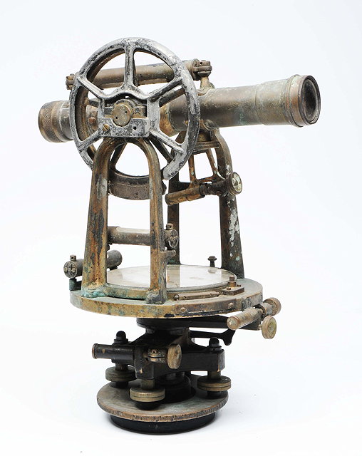 Appraisal: AN OLD BRASS THEODOLITE the central compass signed Keuffel Esser