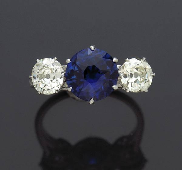 Appraisal: A sapphire and diamond ring estimated total diamond weight carats