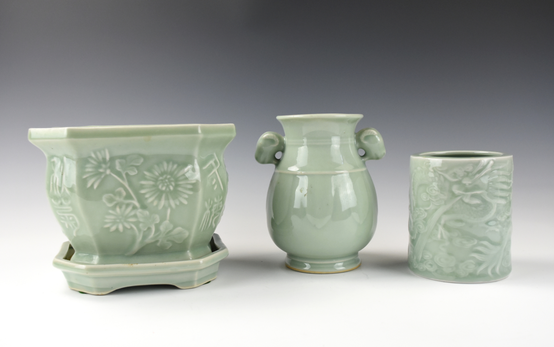 Appraisal: CHINESE CELADON FLOWER BASIN BRUSH POT AND VASE Celadon flower