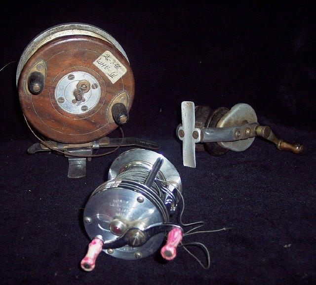 Appraisal: A Shakespeare Intrinsic level winding fishing reel and two others