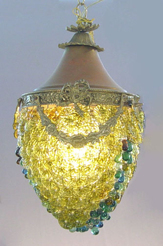 Appraisal: VENETIAN GLASS HANGING LAMP Amber glass discs with blue and