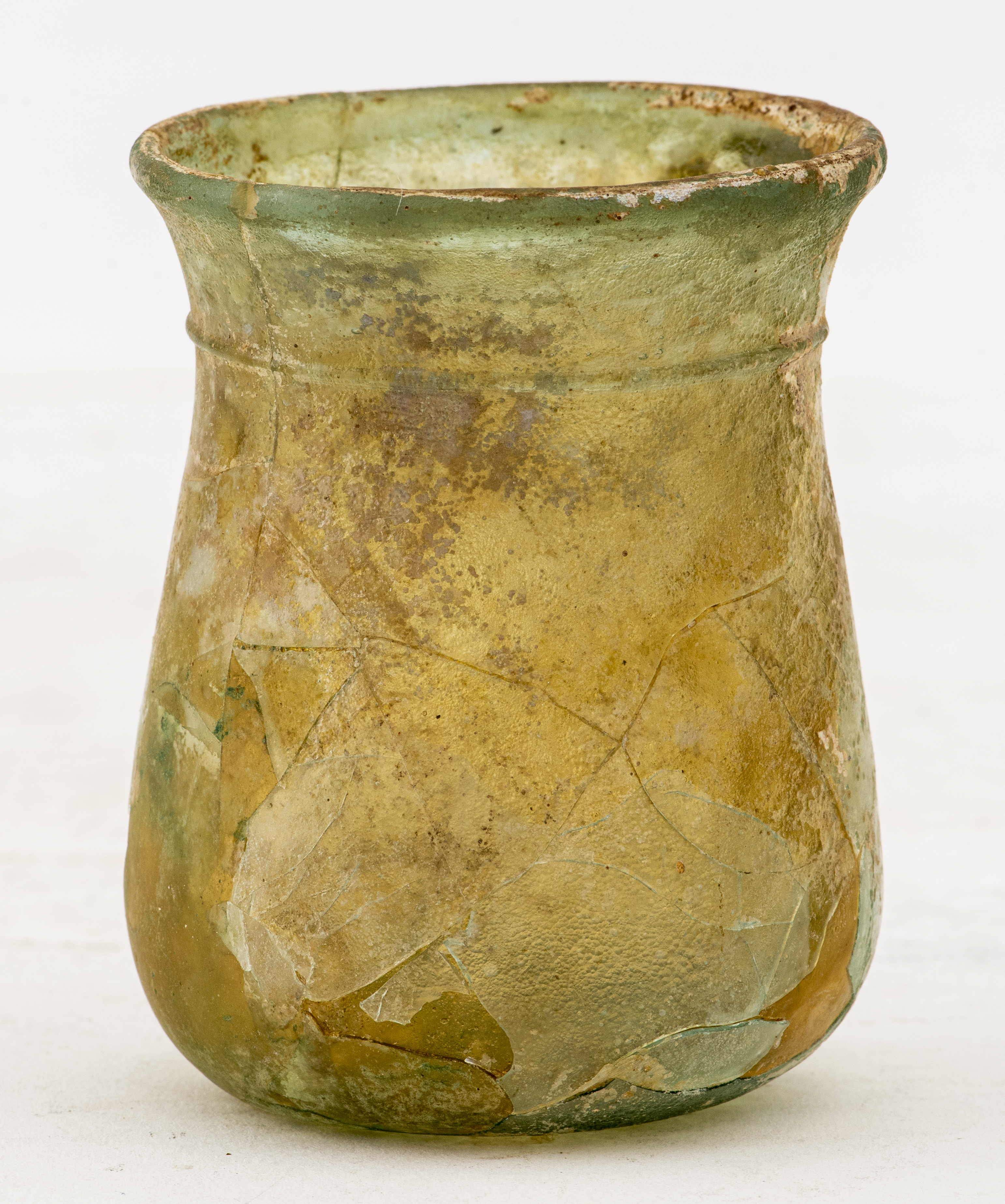 Appraisal: ANCIENT ROMAN GLASS BEAKER WITH CARINATED SIDES Roman pale blue