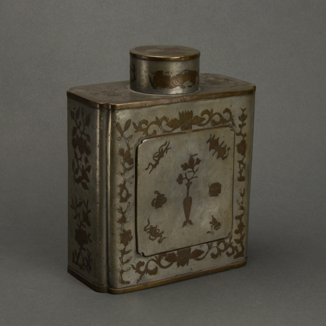 Appraisal: CHINESE PEWTER WITH BRASS INLAY TEA CADDY Chinese pewter with