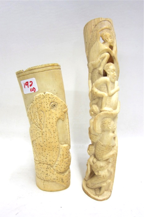 Appraisal: A PAIR OF HAND CARVED ORIENTAL IVORY VASES each of