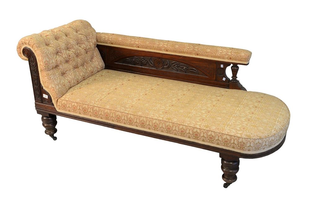 Appraisal: Victorian Fainting Couch with carved panel back on turned legs