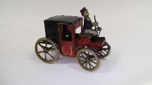 Appraisal: A Lehmann DRGM clockwork post carriage with driver cm long