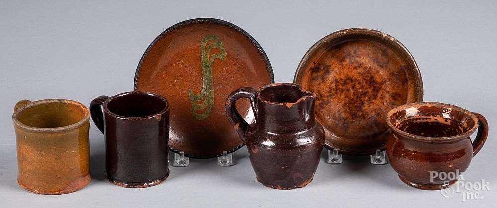 Appraisal: Six pieces of Pennsylvania redware th c Six pieces of