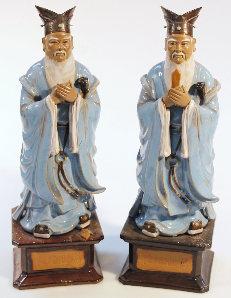 Appraisal: A pair of Chinese Republican period pottery figures of bearded