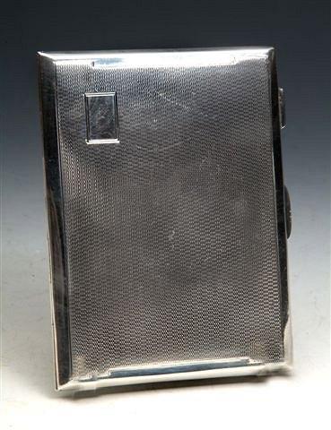 Appraisal: AN ART DECO SILVER CIGARETTE CASE with engine turned decoration