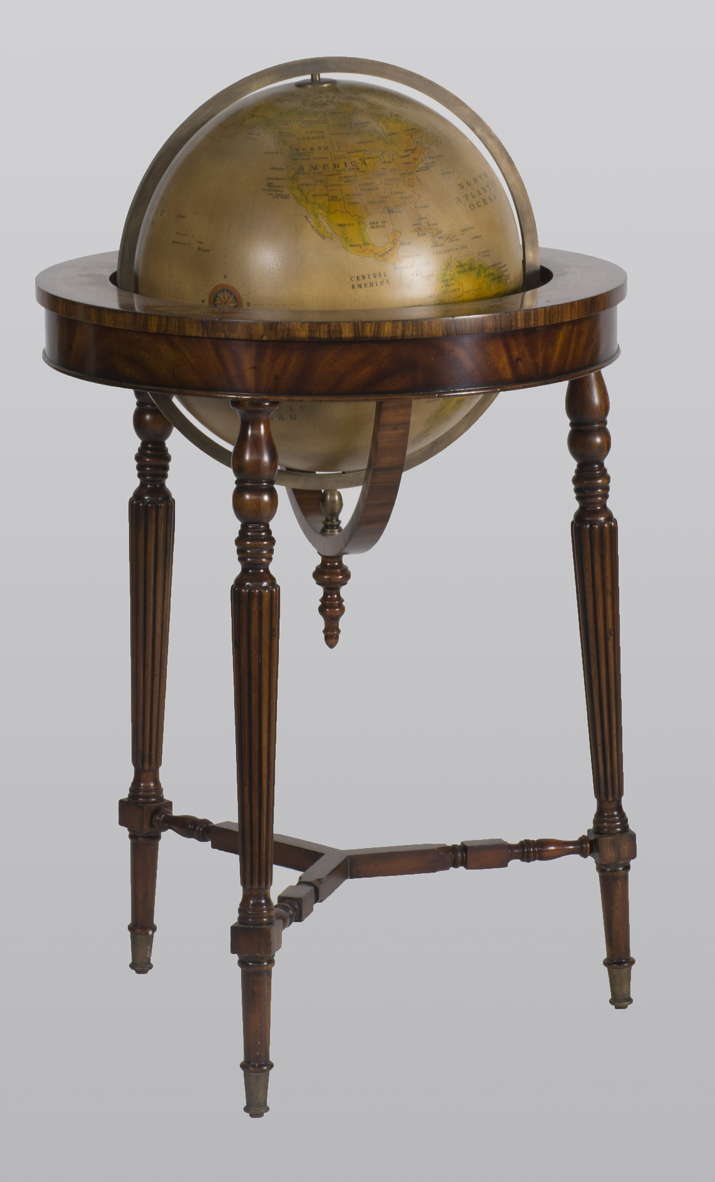 Appraisal: TERRESTRIAL GLOBE ON TRI-LEGGED STAND Circa Stand in mahogany and