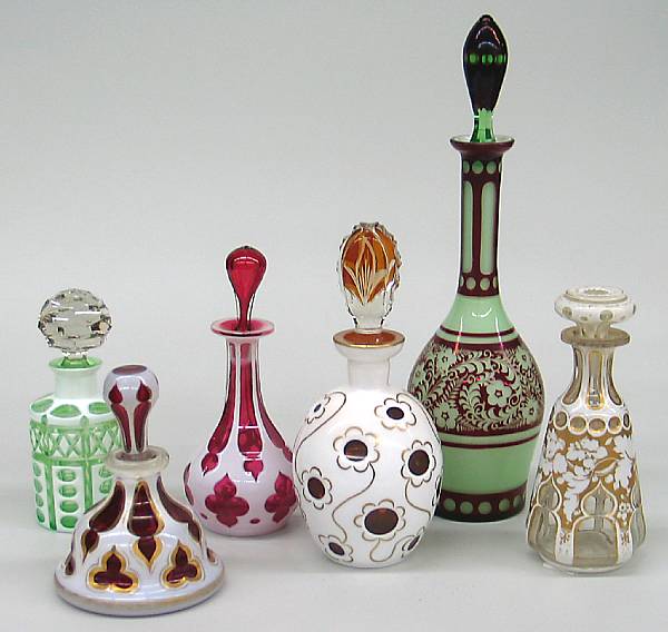 Appraisal: Five Bohemian opaque cased cut to clear bottles and a