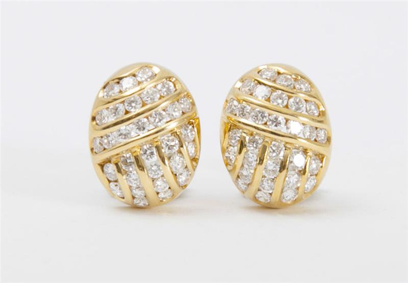 Appraisal: PAIR OF TIFFANY CO K GOLD AND DIAMOND EARCLIPS Set