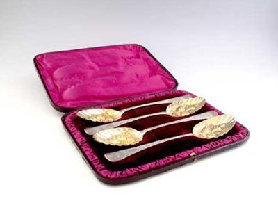 Appraisal: A cased set of four later decorated 'berry' tablespoons with