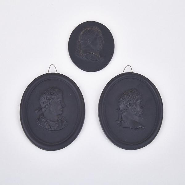 Appraisal: Three Wedgwood Black Basalt Oval Portrait Medallions of Roman Emperors