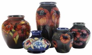 Appraisal: Five Moorcroft Pottery Vases Burslem England decorated with flowers -