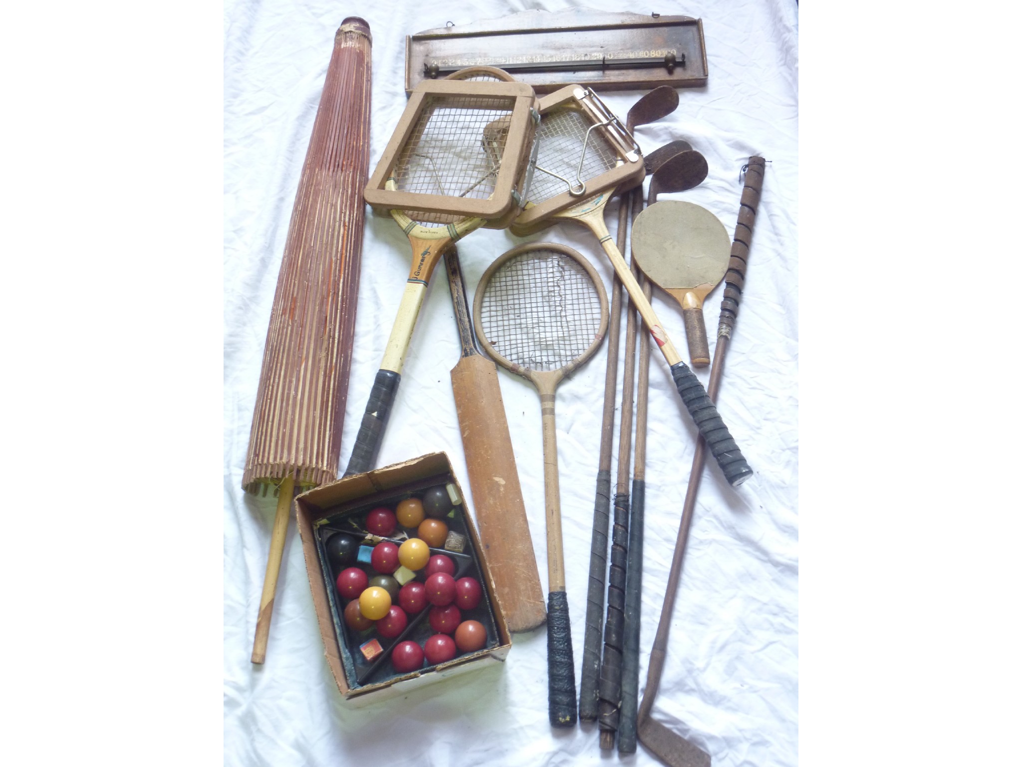 Appraisal: A collection of vintage golf clubs timber tennis rackets a