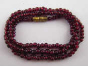 Appraisal: A ruby bead necklace approx cm beads approx mm