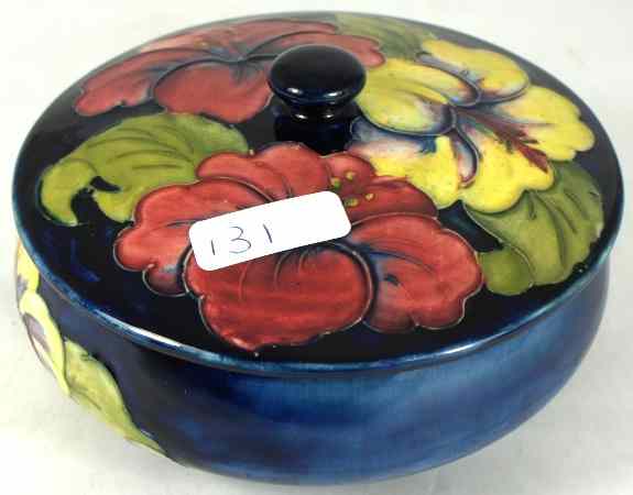 Appraisal: Moorcroft Hibiscus round box and cover blue background diameter cm