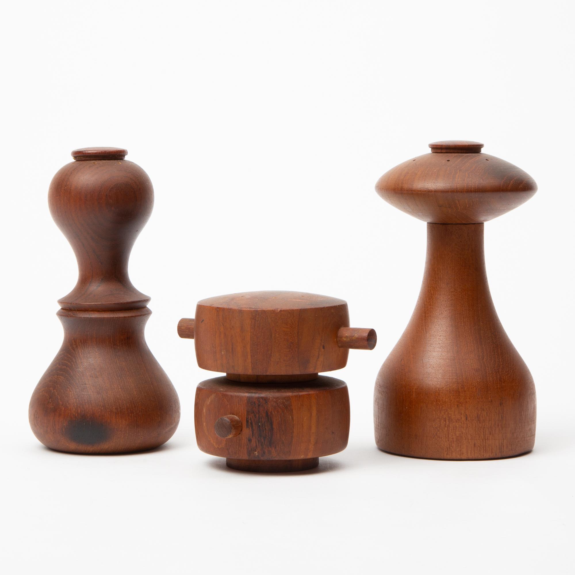 Appraisal: THREE JENS QUISTGAARD SALT SHAKER PEPPERMILLS A lot of three