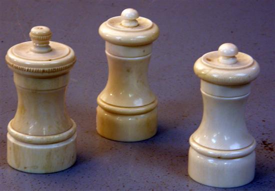 Appraisal: Pair of early twentieth century ivory pepper grinders and another