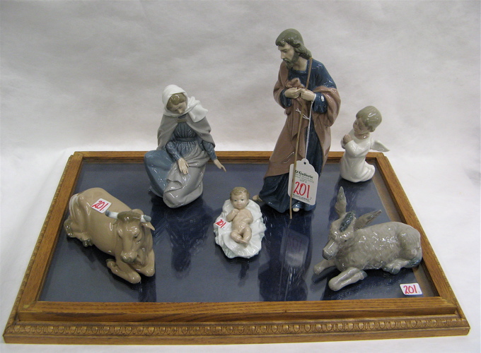 Appraisal: LLADRO PORCELAIN NATIVITY FIGURES A DISPLAY STAND pieces total the