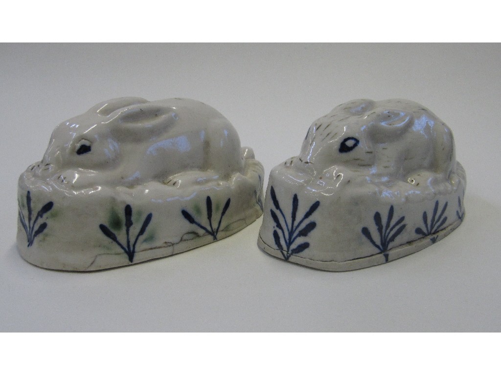 Appraisal: Pair of Staffordshire figures of rabbit modelled crouching slight def