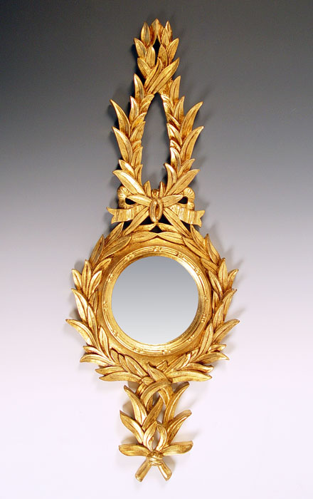 Appraisal: FRENCH EMPIRE GILT WOOD MIRROR Round looking glass framed by