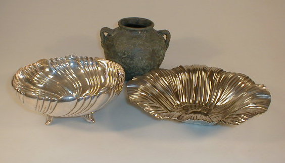 Appraisal: Two WMF modern plated bowls and a pottery urn