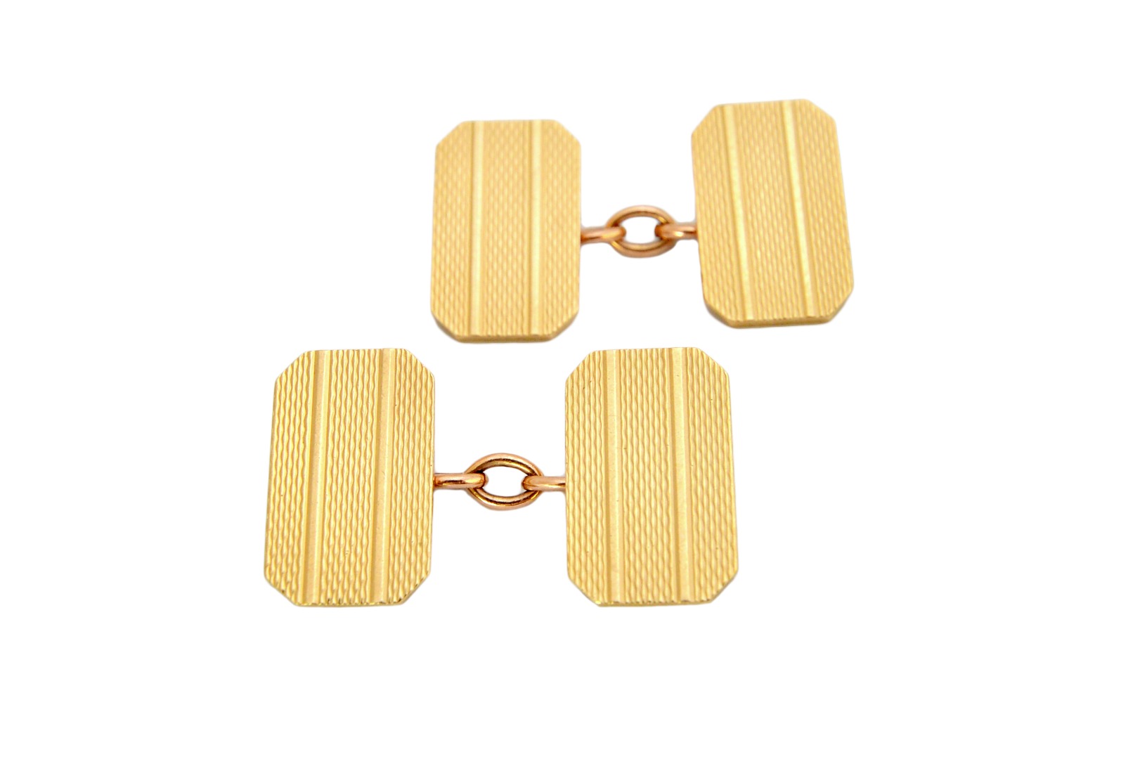 Appraisal: A pair of ct gold cut cornered rectangular cufflinks with