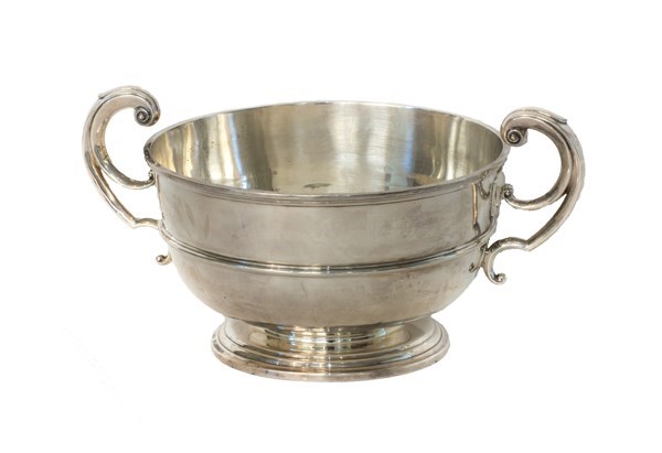 Appraisal: A silver twin handled large fruit trophy bowl with scrolling