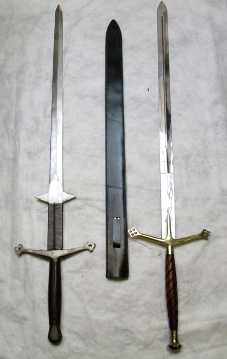 Appraisal: TWO LARGE FANTASY SWORDS the first a double sided spear