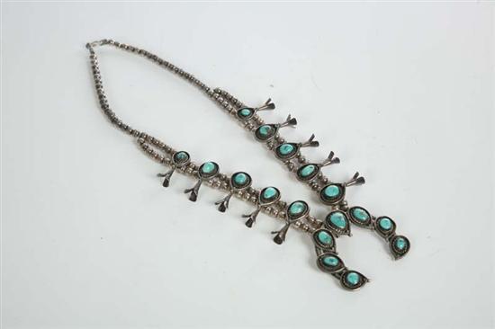 Appraisal: SQUASH BLOSSOM NECKLACE Turqoise and silver Ten blossoms set with