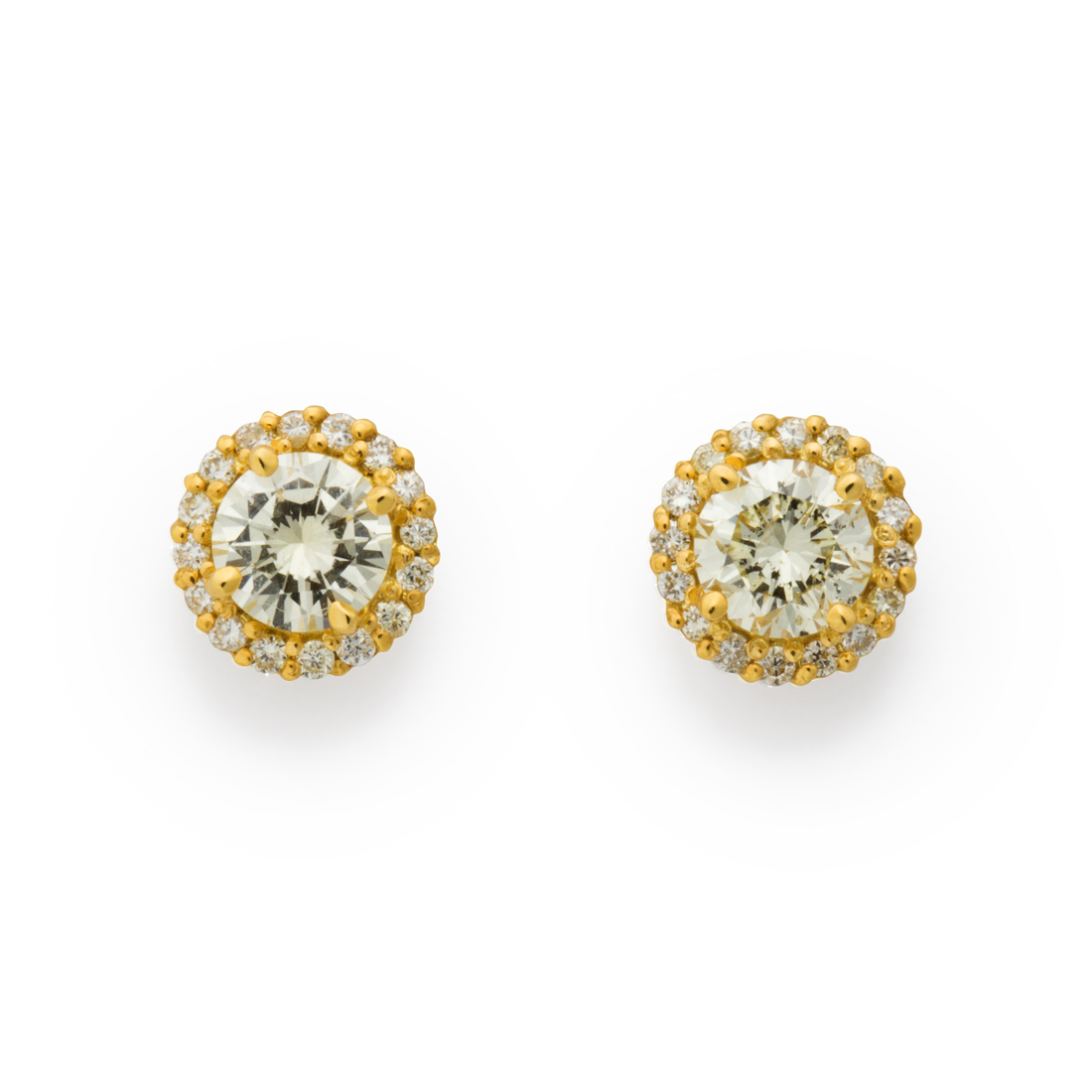 Appraisal: A PAIR OF DIAMOND AND EIGHTEEN KARAT GOLD STUD EARRINGS