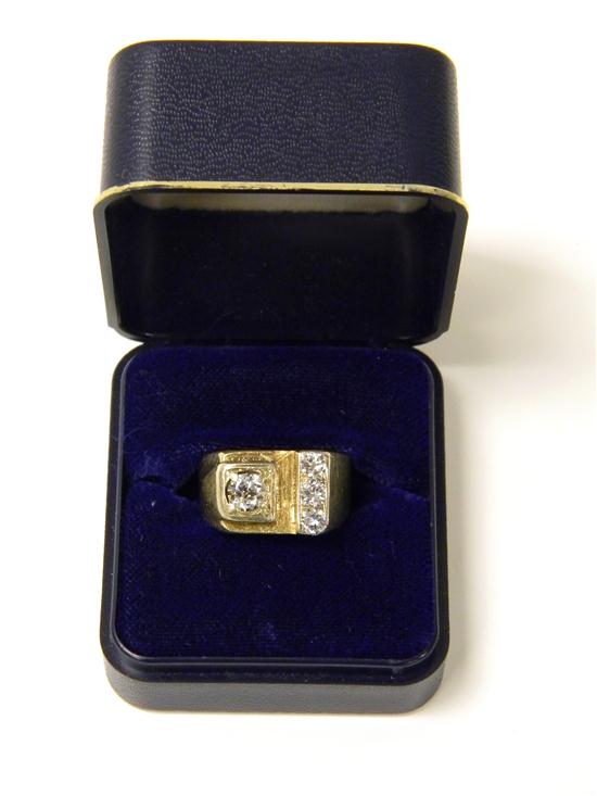 Appraisal: JEWELRY MAN'S FOUR STONE DIAMOND RING K yellow gold contains