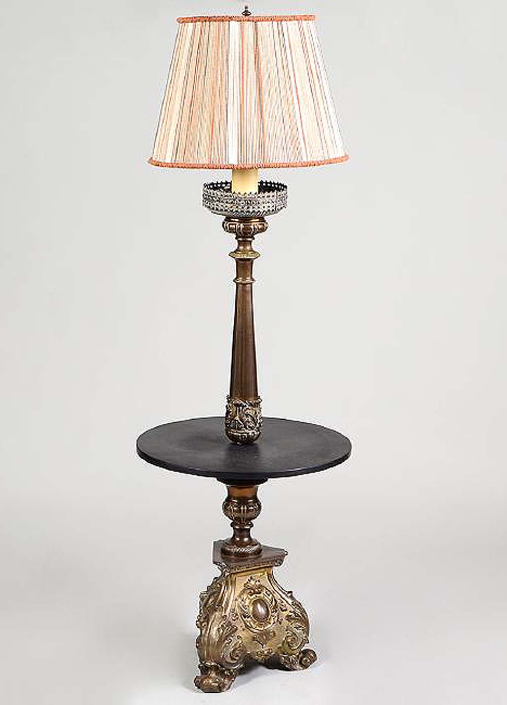 Appraisal: BAROQUE STYLE BRASS STANDING ALTERSTICK TABLEAdapted Circa The candle stand