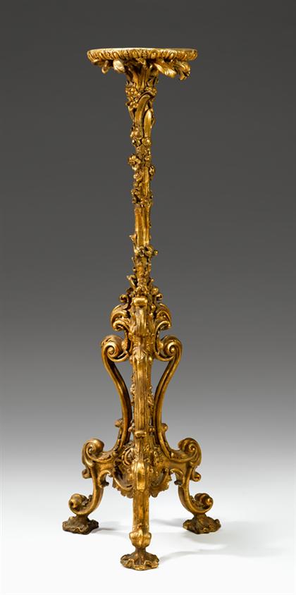 Appraisal: Venetian carved giltwood torchere th century The circular top above