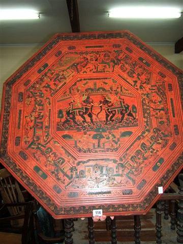 Appraisal: An Oriental red lacquered octagonal table wide