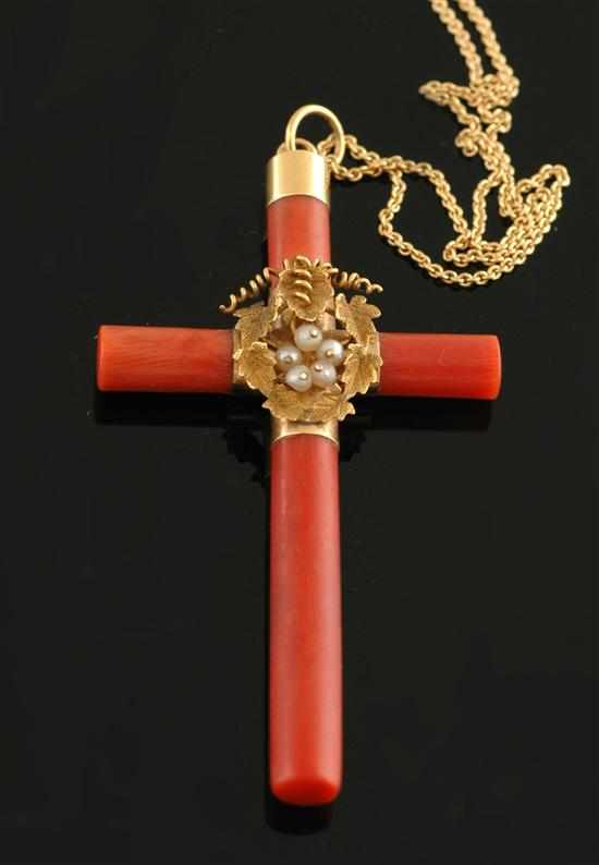 Appraisal: An Antique coral cross pendant Centred with raised vine leaves